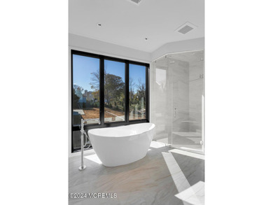 Experience unobstructed panoramic water views of the Manhattan - photo 20