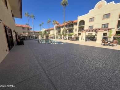 This lovely 2 bedroom condo has its own private patio with