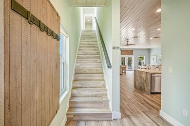 Discover this coastal luxury and pristine 2019-built, 7-bedroom - photo 40