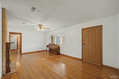 Welcome to this charming 1950s ranch-style home situated on a - photo 3