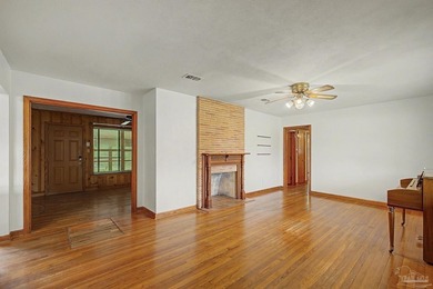 Welcome to this charming 1950s ranch-style home situated on a - photo 4