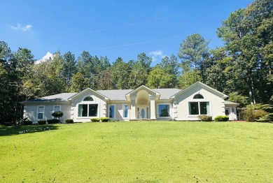 Lake Home For Sale in Selmer, Tennessee