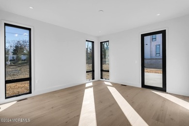 Experience unobstructed panoramic water views of the Manhattan - photo 11