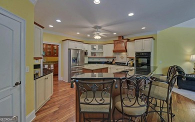 Custom-built lakefront home located within the city limits of - photo 12