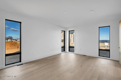 Experience unobstructed panoramic water views of the Manhattan - photo 13