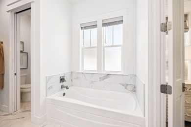Located in WaterSound Origins, this Ficus plan built by Huff - photo 21