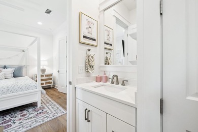Located in WaterSound Origins, this Ficus plan built by Huff - photo 28
