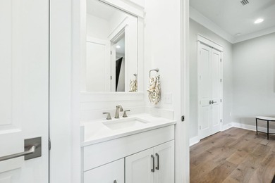 Located in WaterSound Origins, this Ficus plan built by Huff - photo 30