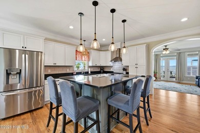 WOW! Built in 2021, this exceptional custom waterfront home is - photo 7