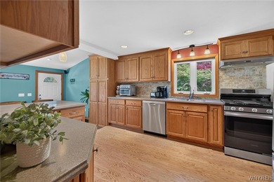 Welcome to 1890 Center Road in West Seneca! Set on 1.2 beautiful - photo 16