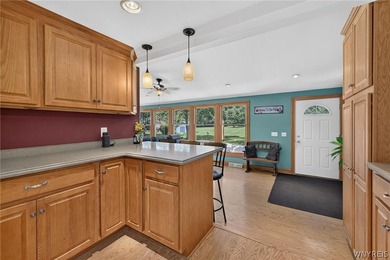 Welcome to 1890 Center Road in West Seneca! Set on 1.2 beautiful - photo 17
