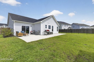 Welcome home to this beautifully maintained 4-bedroom, 2-bath - photo 31