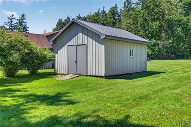 Welcome to 1890 Center Road in West Seneca! Set on 1.2 beautiful - photo 40