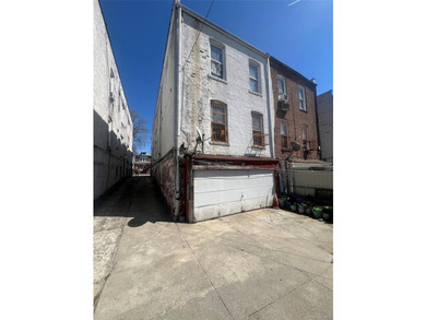 With over 3100 sq ft of living space, this solid brick building - photo 4