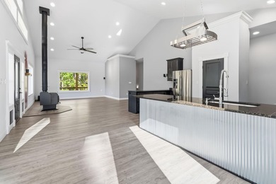 First time ever on the market, this custom-built 2015 home sits - photo 13