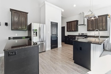 First time ever on the market, this custom-built 2015 home sits - photo 15