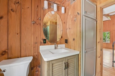 Nestled among mature hardwoods on a private, wooded homesite - photo 22