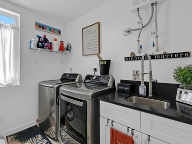 Welcome to this stunning 3 bedroom, 2.5 bathroom, 3 story home - photo 50
