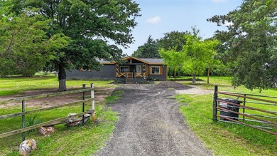 Beautifully remodeled manufactured home on 2.5 acres in Quinlan - photo 1