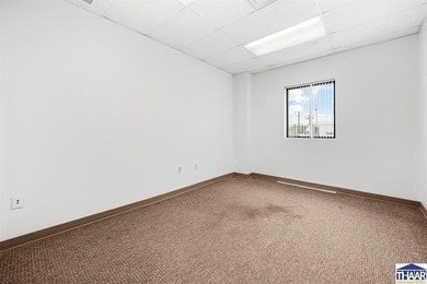 Office area with 4 private offices, large area for cubicles