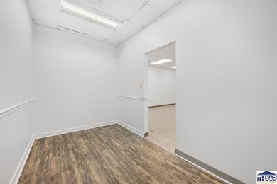 Office area with 4 private offices, large area for cubicles