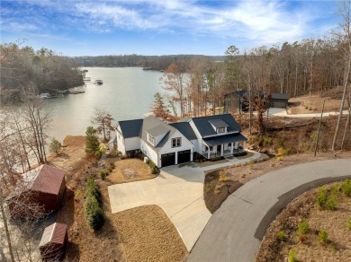 Lake Home For Sale in Six Mile, South Carolina