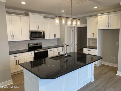 Exceptional new construction directly across from Aberdeen Lake - photo 5