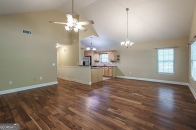Set along the coveted shoreline of Lake Oconee, this exceptional - photo 12