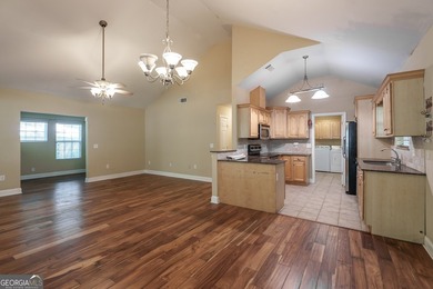Set along the coveted shoreline of Lake Oconee, this exceptional - photo 13