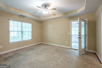 Set along the coveted shoreline of Lake Oconee, this exceptional - photo 27