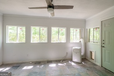 Set along the coveted shoreline of Lake Oconee, this exceptional - photo 32