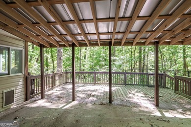 Set along the coveted shoreline of Lake Oconee, this exceptional - photo 36