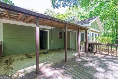Set along the coveted shoreline of Lake Oconee, this exceptional - photo 38