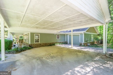 Set along the coveted shoreline of Lake Oconee, this exceptional - photo 40