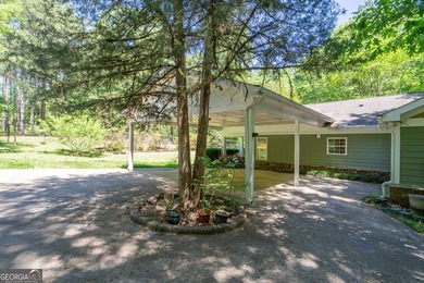 Set along the coveted shoreline of Lake Oconee, this exceptional - photo 42