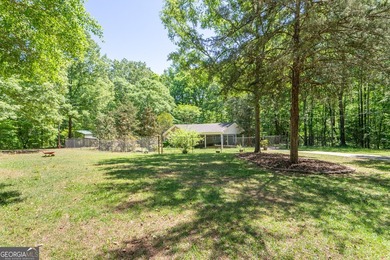 Set along the coveted shoreline of Lake Oconee, this exceptional - photo 43
