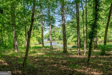 Set along the coveted shoreline of Lake Oconee, this exceptional - photo 48