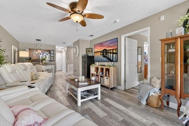 First-floor unit with breathtaking river views! Don't miss this - photo 11