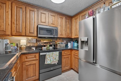 First-floor unit with breathtaking river views! Don't miss this - photo 13