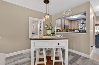 First-floor unit with breathtaking river views! Don't miss this - photo 15