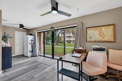 First-floor unit with breathtaking river views! Don't miss this - photo 23