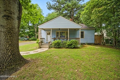 Welcome to this well-built 2-bedroom, 1-bath home located on the - photo 1