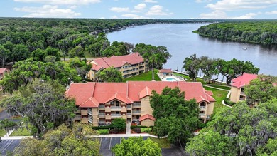 First-floor unit with breathtaking river views! Don't miss this - photo 33
