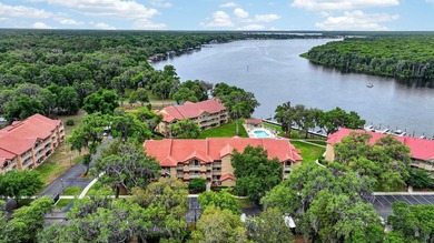 First-floor unit with breathtaking river views! Don't miss this - photo 35
