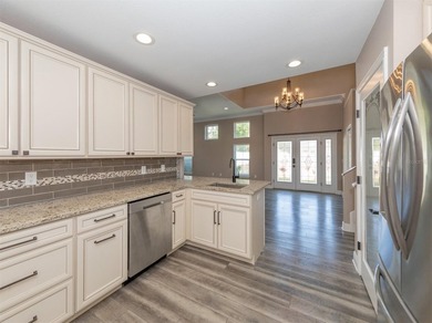 If you've been searching for a spacious townhome that lives like - photo 11