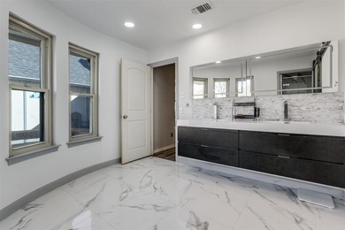 Located minutes from Sherrill Park Golf Course, this remodeled - photo 2