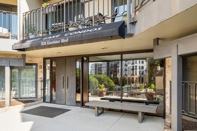 Welcome home to this beautifully updated corner unit offering an - photo 1