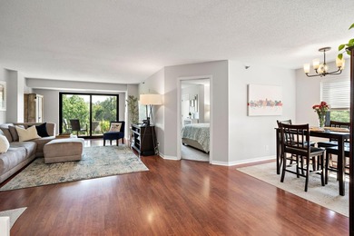 Welcome home to this beautifully updated corner unit offering an - photo 2