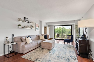 Welcome home to this beautifully updated corner unit offering an - photo 3