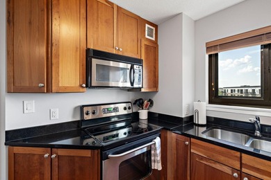 Welcome home to this beautifully updated corner unit offering an - photo 9